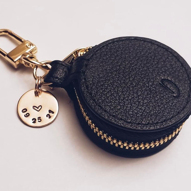 The Ring Keeper in Black & Gold, adorned with stainless steel dated charm in rosegold finish.